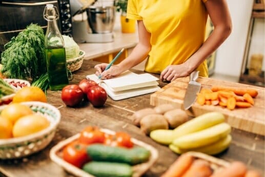 female person cooking kitchen healthy bio food